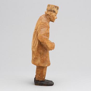 Axel Petersson Döderhultarn, sculpture. Signed. Carved and partly painted wood. Height 25.5 cm.