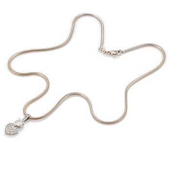 A chain and a pendant set with eight-cut and a round, brilliant-cut diamond.