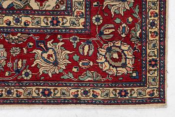 A Tabriz carpet, c. 385 x 287 cm.