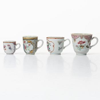 A group of 12 famille rose cups, Qing dynasty, Qianlong (1736-95).
