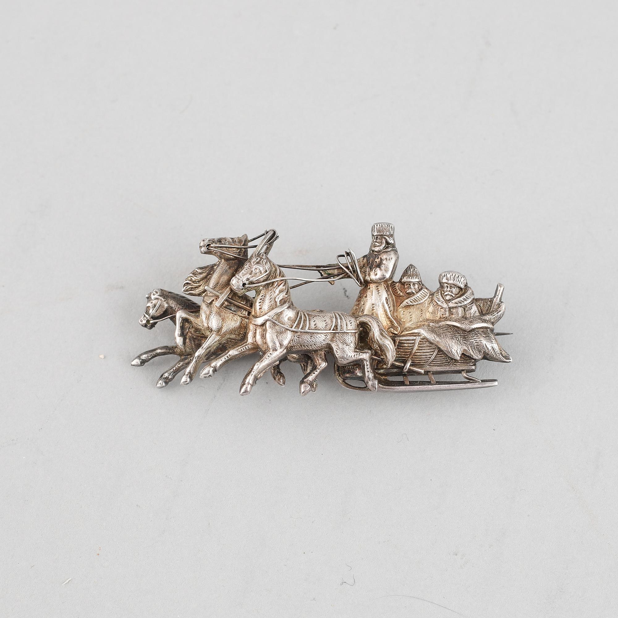 A Russian late 19th century silver broach, marked St. Petersburg.