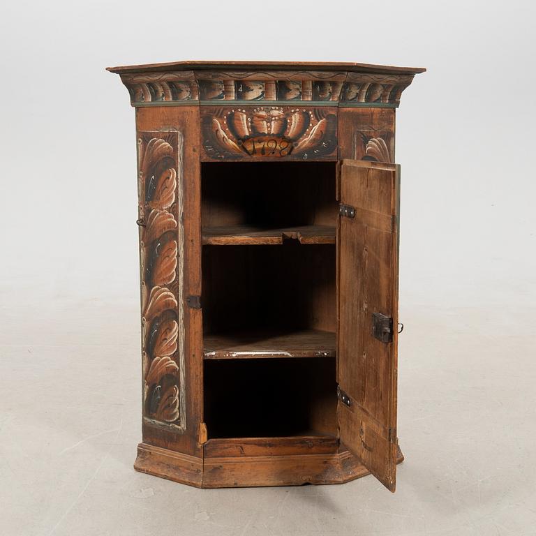 Corner hanging cabinet dated 1798.