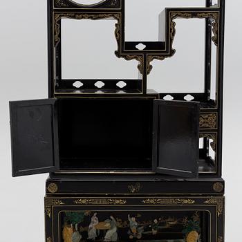 A Chinese lacquered shelf with stone inlay, 20th Century.