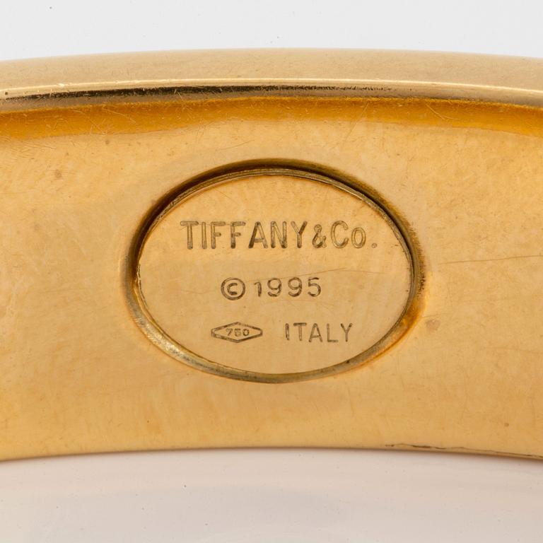 A Tiffany bangle "Atlas" in 18K gold.