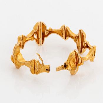 An 18K gold Lapponia bracelet.