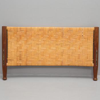 JOSEF FRANK, a model 520 mahogany and rattan bed from Svenskt Tenn.