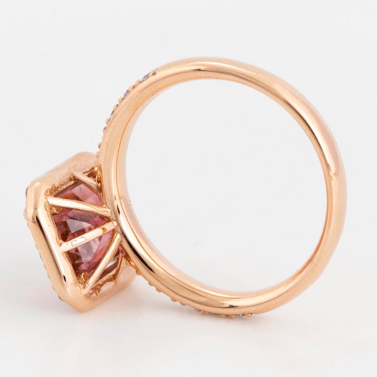 Emerald-cut pink tourmaline and brilliant-cut diamond ring.