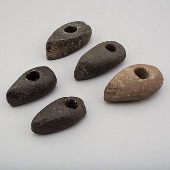 Five neolithic stone axes.