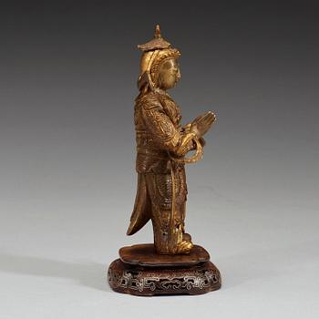 A gilt bronze figure of a Lokapala, Qing dynasty, 19th Century.