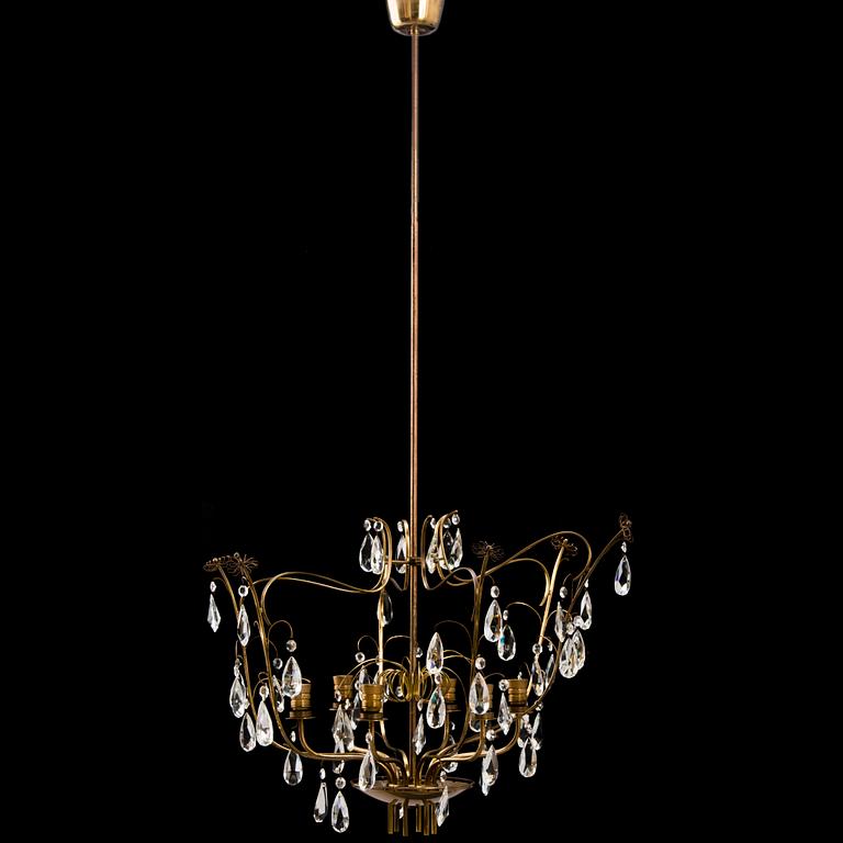PAAVO TYNELL, A mid 20th Century brass chandelier for Oy Taito Ab.