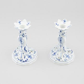 A pair of porcelain candle sticks by Meissen, second half of the 20th century.