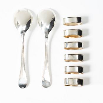 Salad servers, a pair, and six napkin rings, silver, second half of the 20th Century.