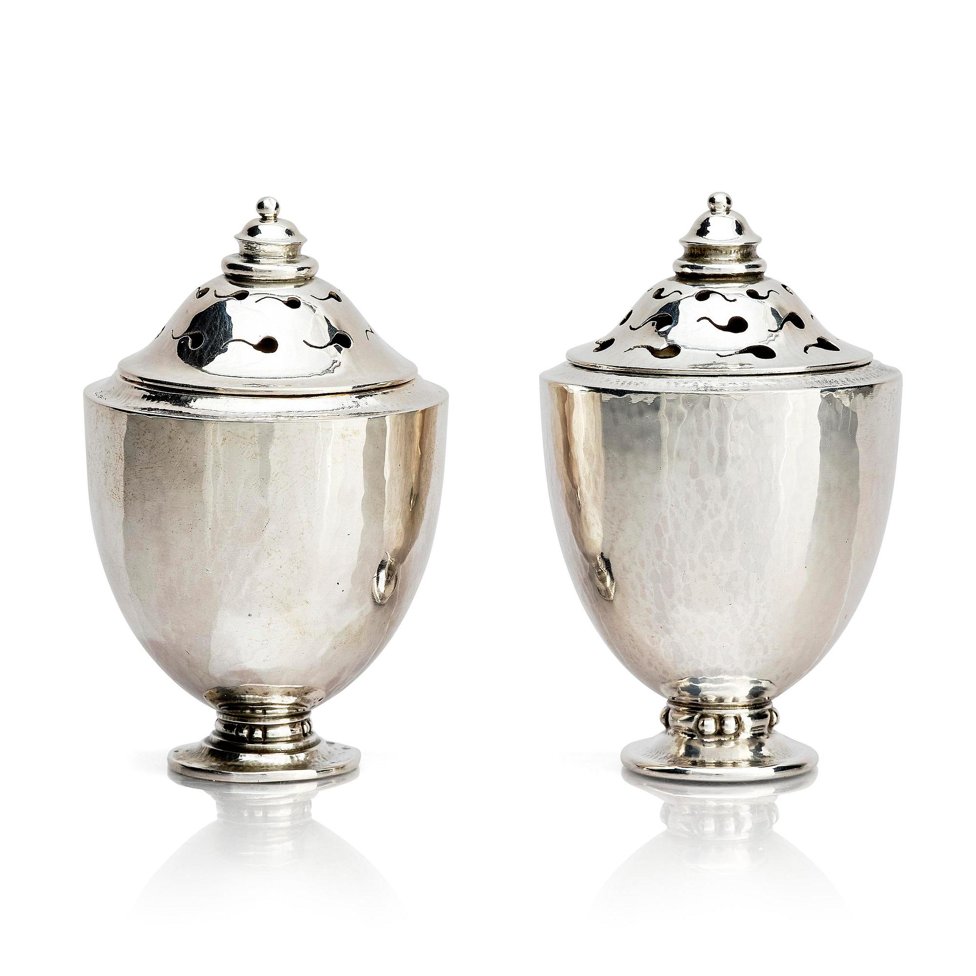 Georg Jensen, a pair of silver casters, design Johan Rohde, Copenhagen 1915-1921.