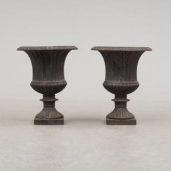 A pair of cast iron plant pots. Second half of the 20th century.