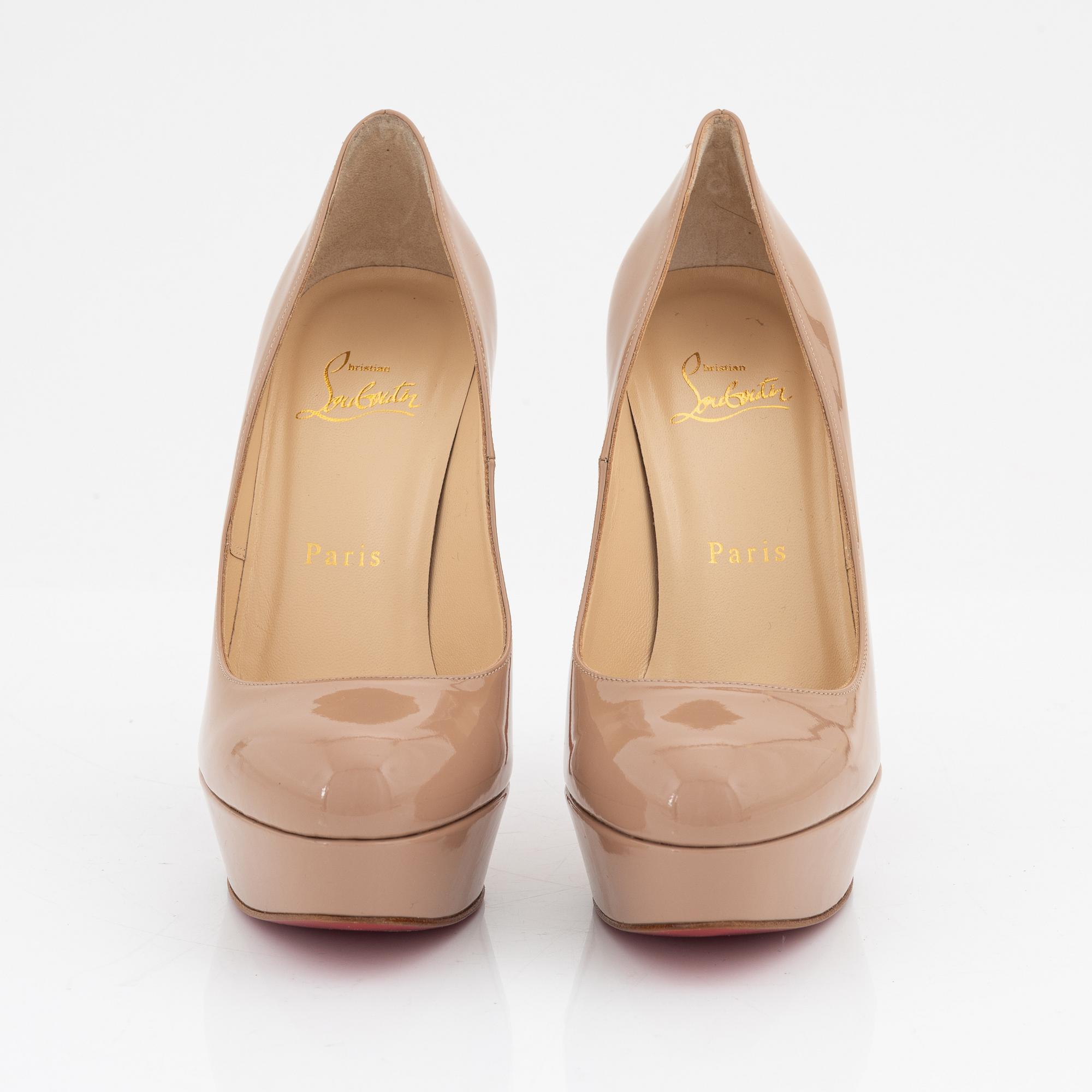 Christian Louboutin, a pair of patent leather pumps, size 37.
