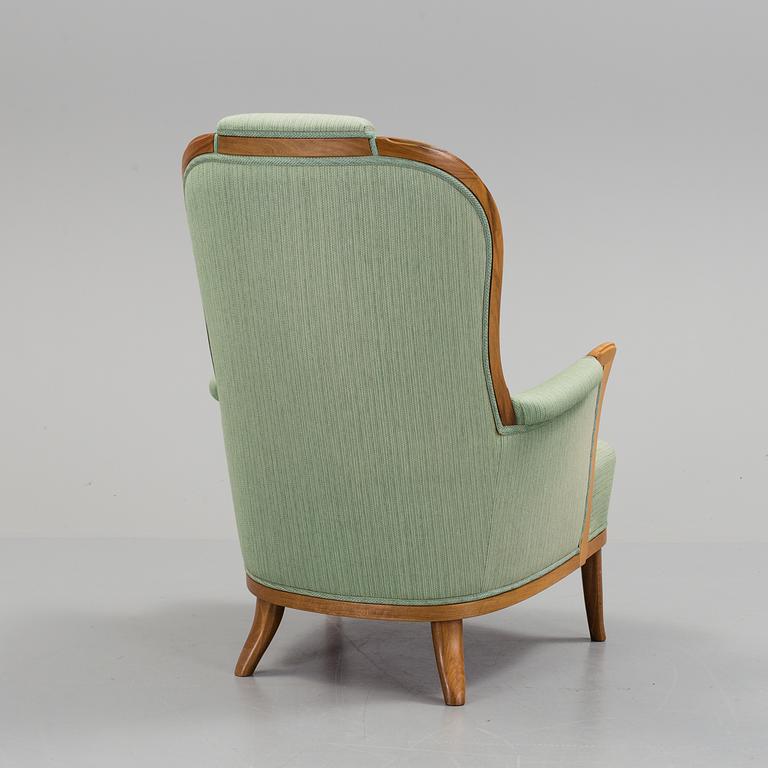 a Carl Malmsten "Vår Fru" armchair from the second half of the 20th century.
