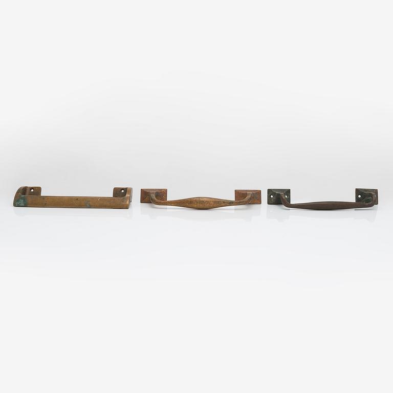 Door handles, three pieces, ca 1900 and 1960s.