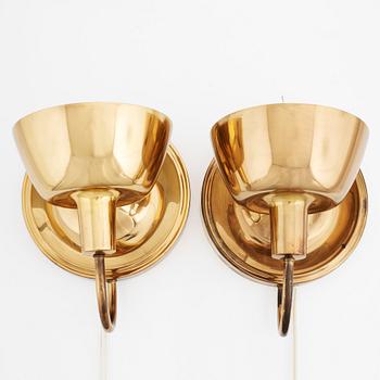 a pair of 'model 2389' wall lights for Svenskt Tenn, Sweden.