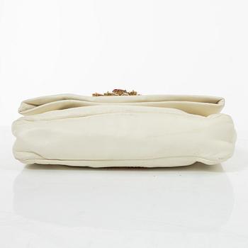 Miu Miu, a handbag/clutch.