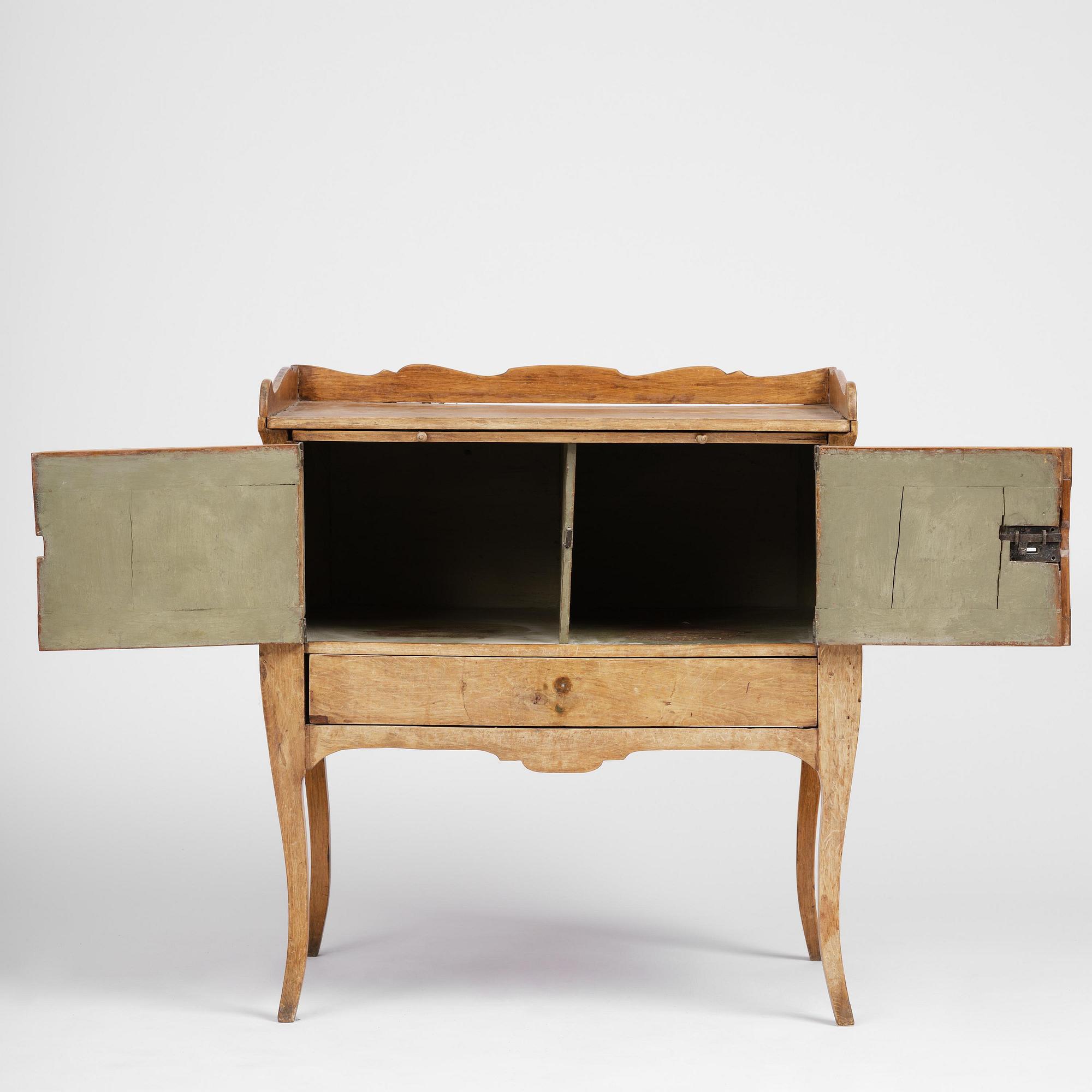 A Swedish rococo chamberpot cupboard, later part 18th century.