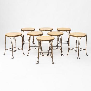A set of eight garden stools, early 20th century.