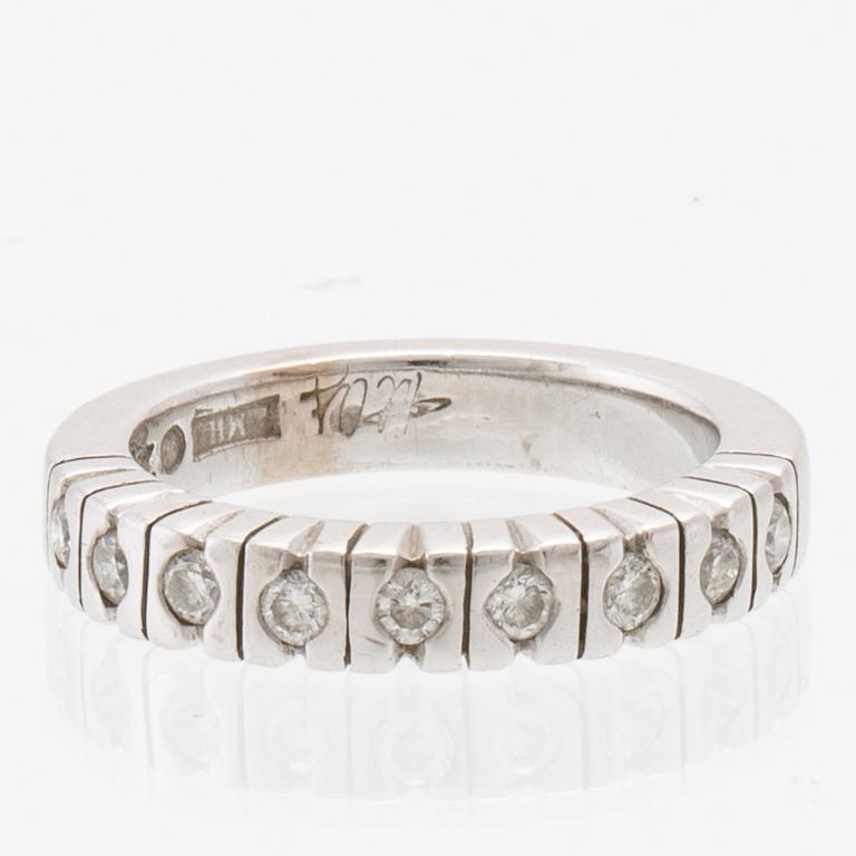 Half-eternity ring in 18K white gold with round brilliant-cut diamonds, Art Metall Helsingborg.