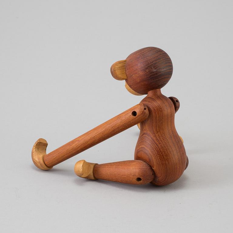 A Kay Bojesen wood figurine in the shape of a monkey.