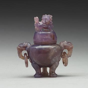 An amethyst tripod censer with cover, China, early 20th Century.