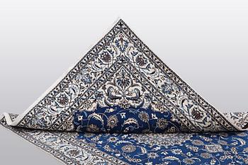 A carpet, Nain, part silk 9 LAA, ca 310 x 203 cm.