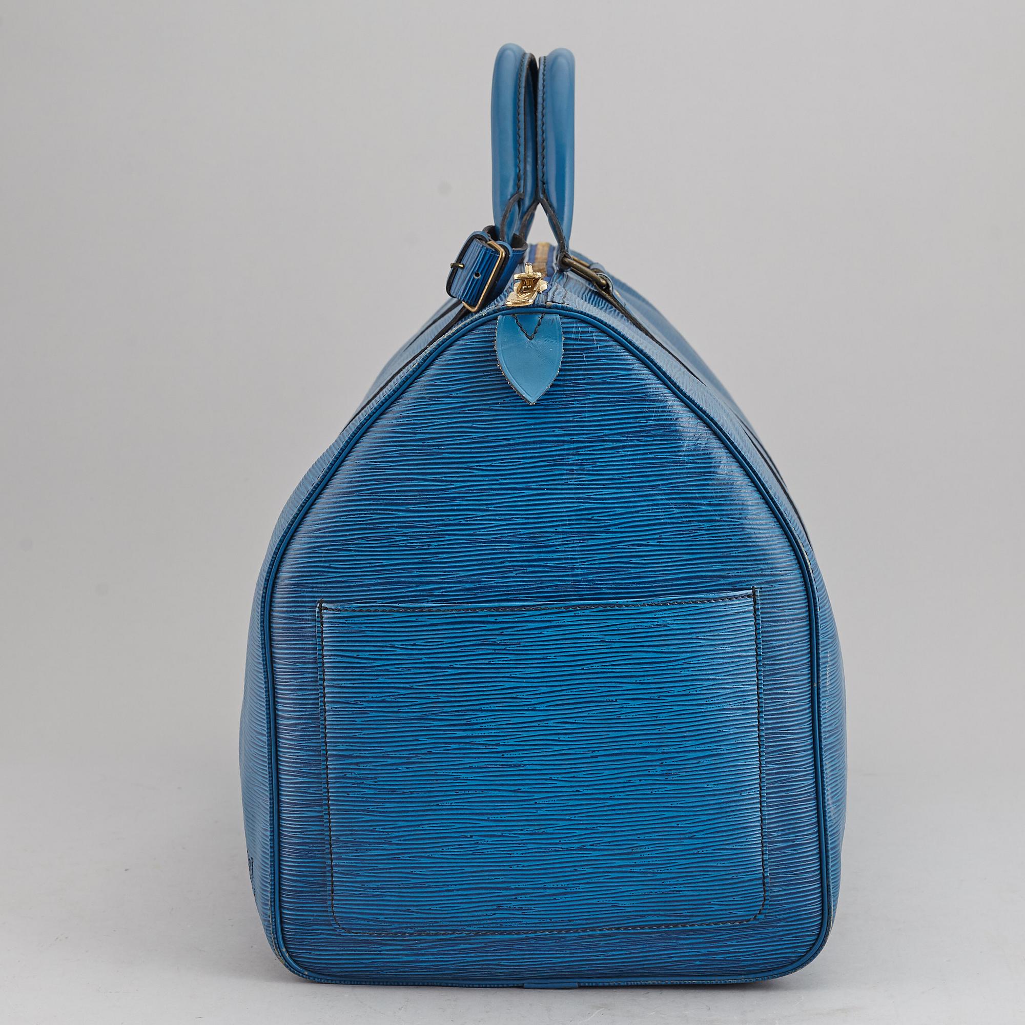 LOUIS VUITTON, a 'Keepall 55 Epi' weekendbag.