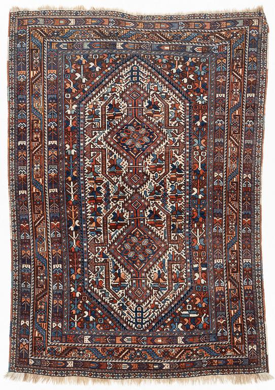 A carpet, Shiraz, circa 211 x 147 cm.