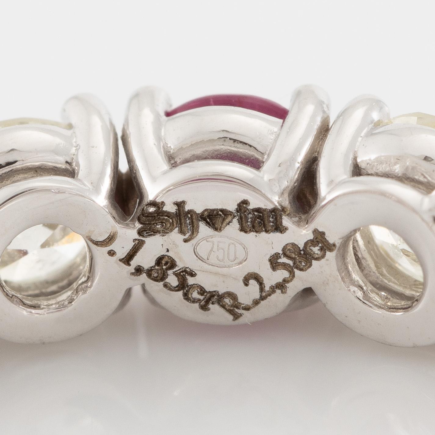 Ring, full eternity band, 18K white gold set with rubies and brilliant-cut diamonds.