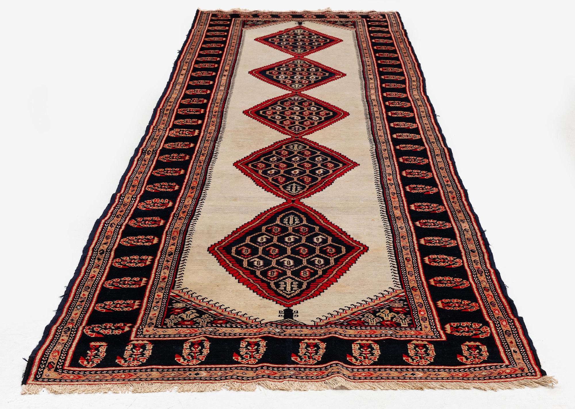 A semi-antique Northwest Persian (Iran) runner, c. 417 x 112 cm.