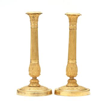 A pair of Empire  early 19th century candlesticks.