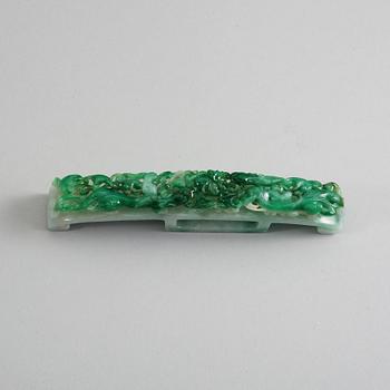 A Chinese carved jadeite belthook, 20th Century.