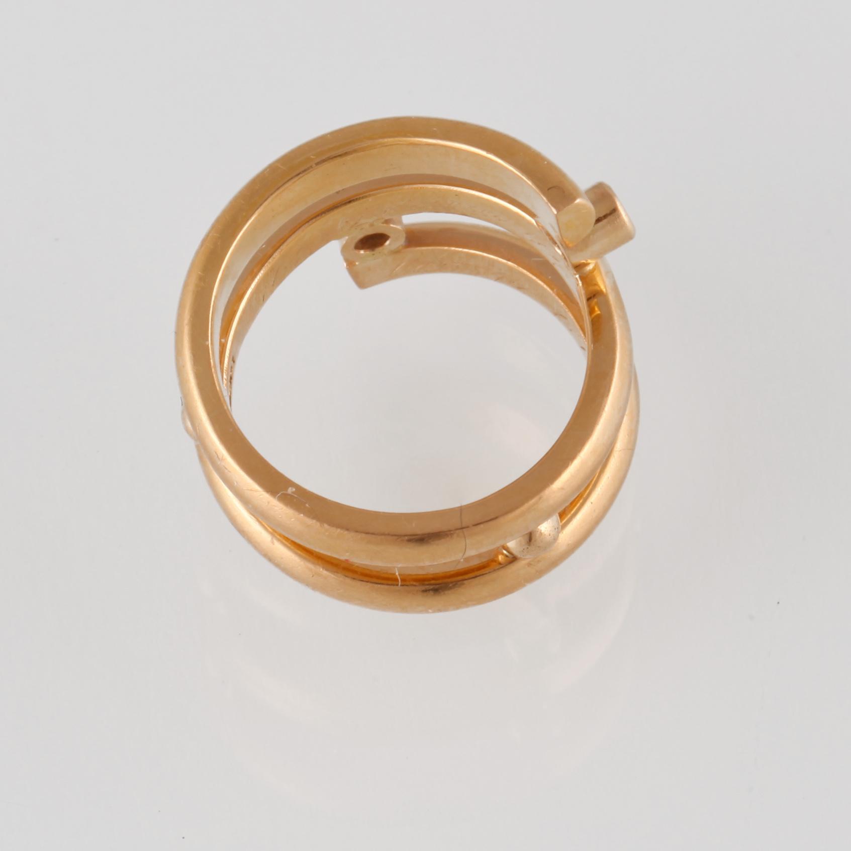 RING, 20K guld med 2 briljantslipade diamanter ca 0.06 ct. Vikt 11,9 gram.