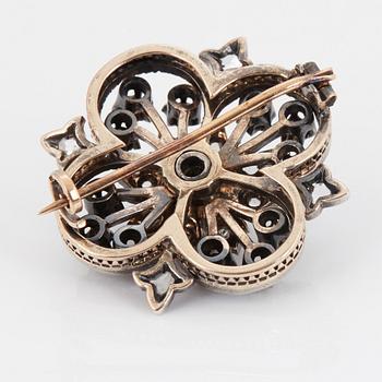A BROOCH.