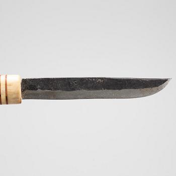 A knife, signed PMK, reportedly Poul Milasson Komsen, dated 1979.