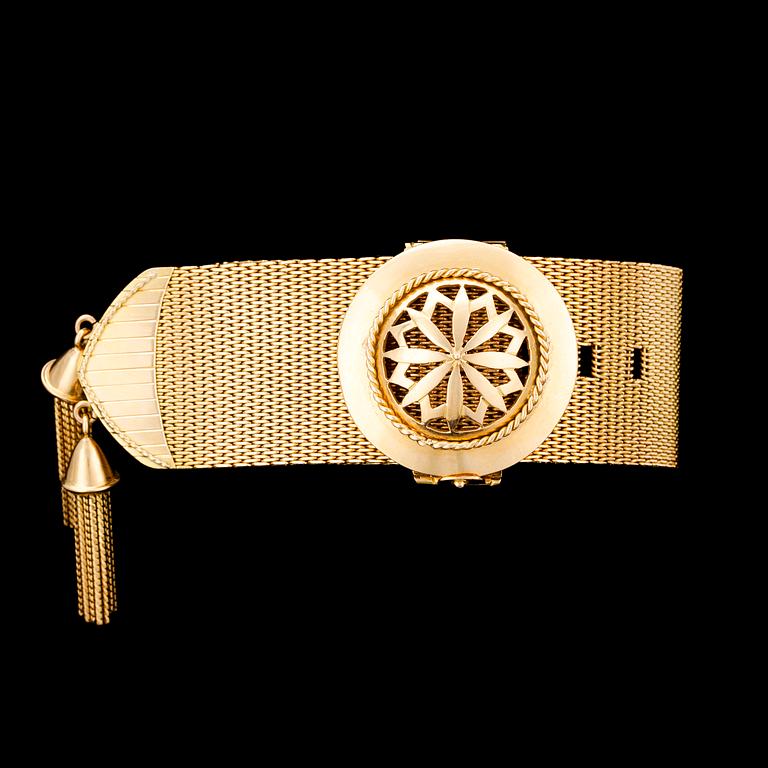 A gold 'garter' bracelet, 1860's.
