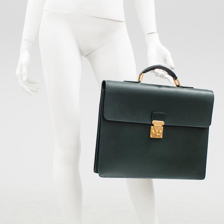 A 'Moskova' taiga leather briefcase from Louis Vuitton.