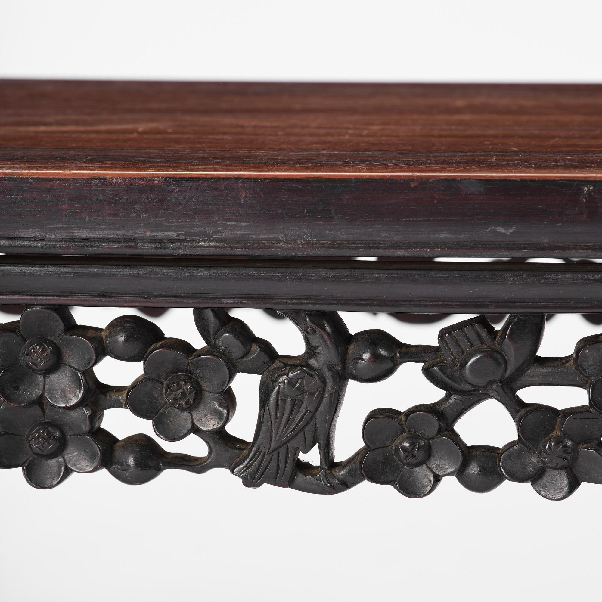 A Chinese hardwood kang table, late Qing dynasty.