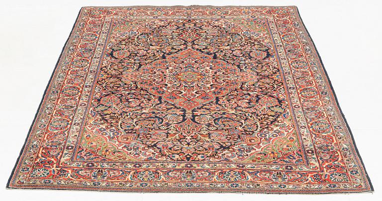 A rug, semi-antique, Sarouk, ca 200 x 129 cm.