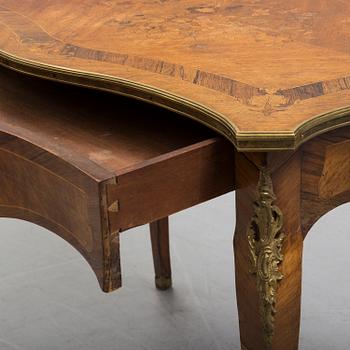 A Louis quinze style table circa 1900.