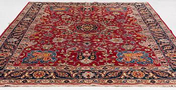 A semi-antique Tabriz carpet, c 358 x 248 cm.