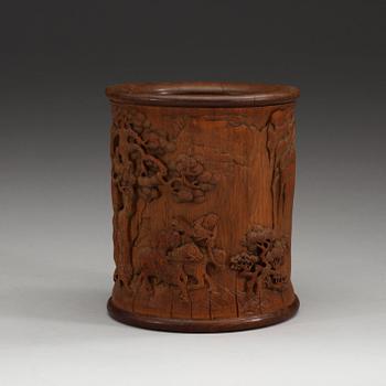 A carved bamboo brush pot, presumably late Qing dynasty (1644-1912).