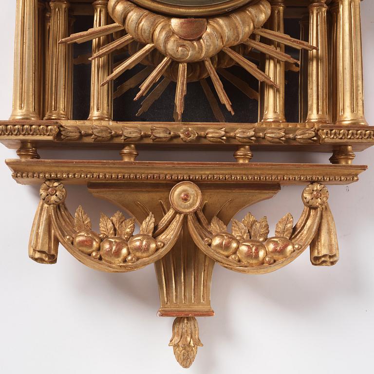 A Gustavian giltwood cartel clock by H. Wessman (watchmaker in Stockholm 1787-1805).