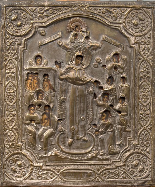 A late 190th century Russian tempera on board with brass rizza icon.