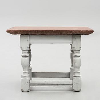 A limestone-top table, Sweden, 18th century.