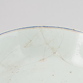 Two large famille rose and gilt punch bowls, Qing dynasty, 18th century.