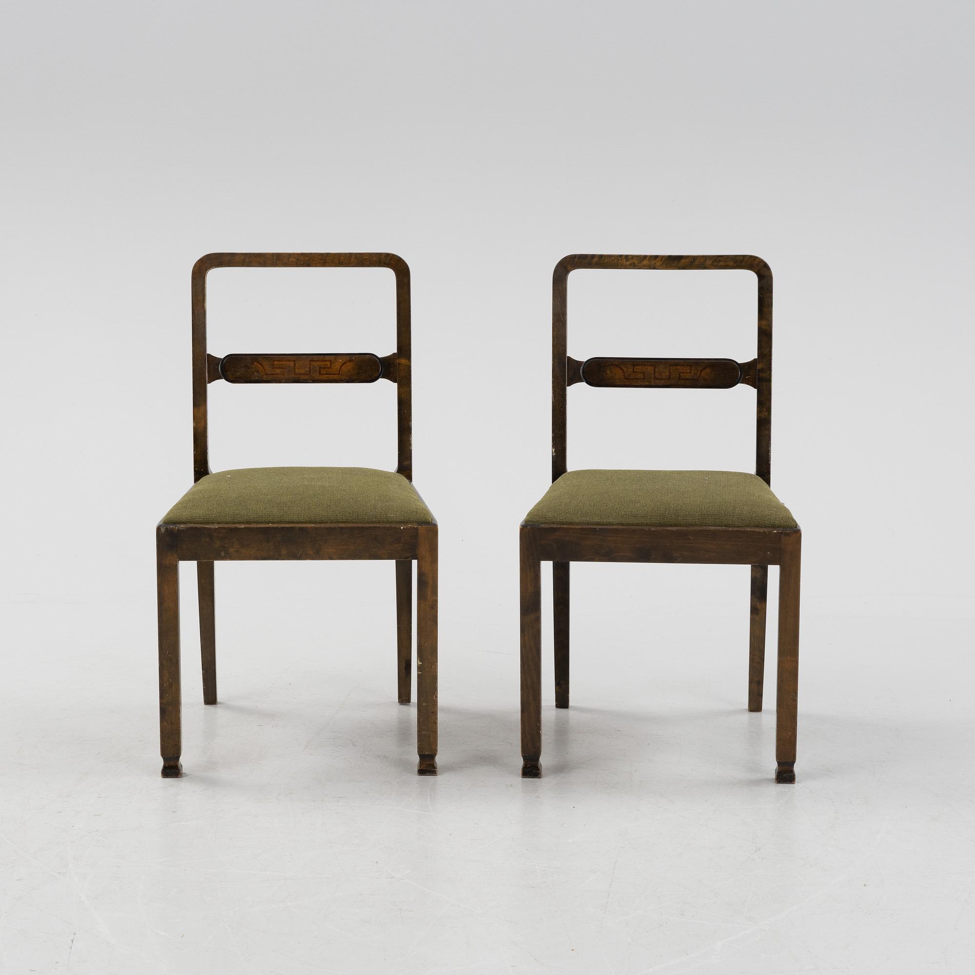 A Swedish Grace birch dining table and four chairs, 1920's/1930's.